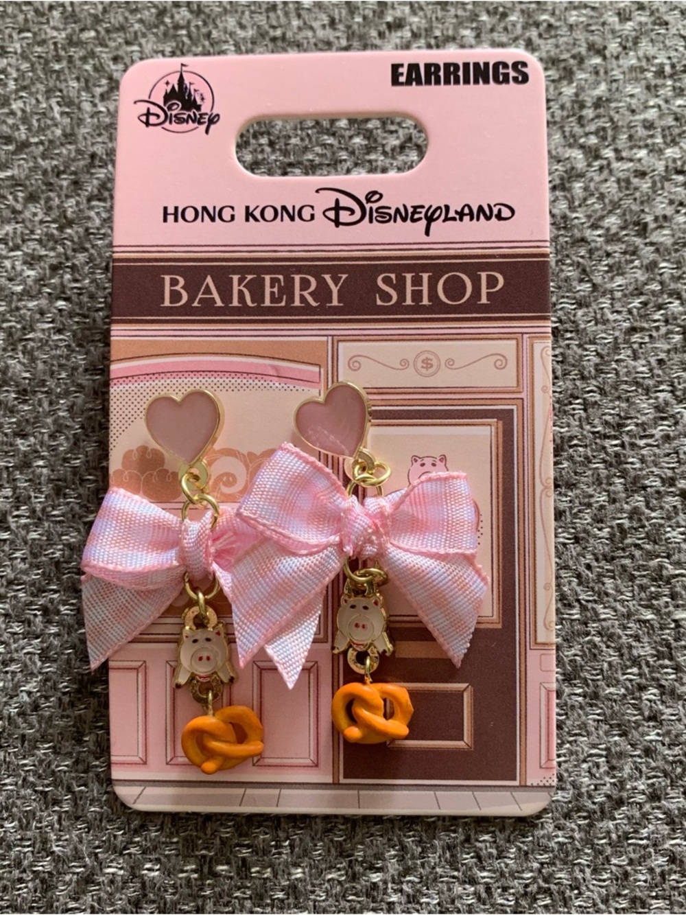 BNWT Hong Kong DisneylanD Toy Story Hamm Bakery Shop Bow Pretzel Earrings